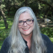 A headshot of Laura Creedle.